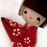 Kokeshi doll - A refuge from the rain
